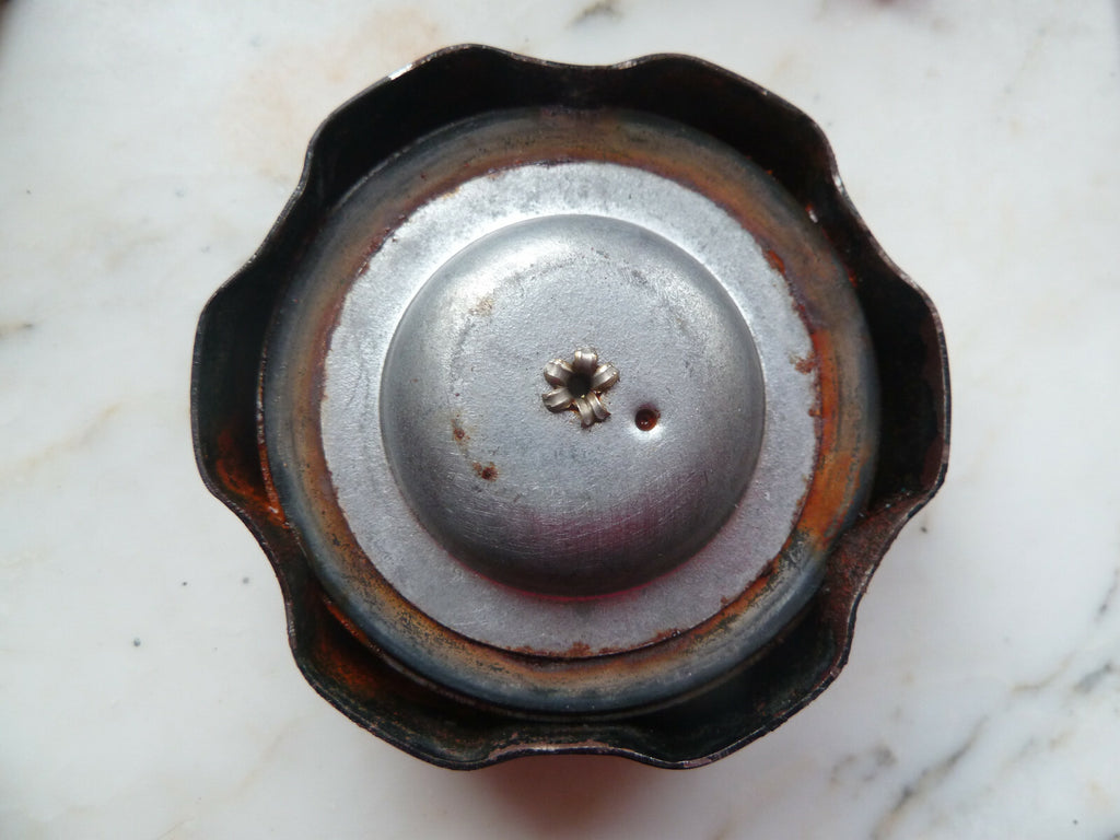 Ancien bouchon de réservoir