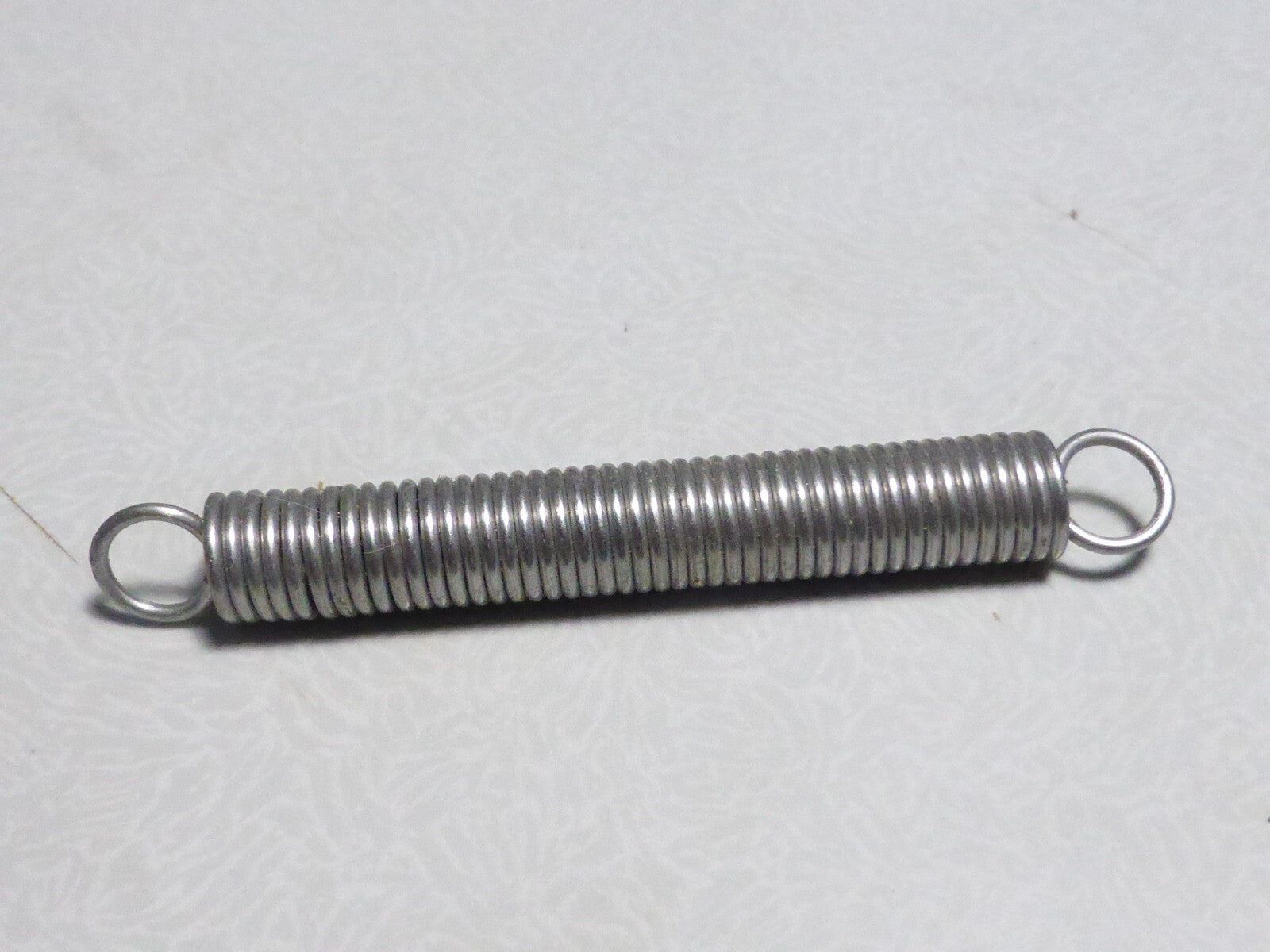 ancien vintage ressort solex peugeot motobecane  ? 62x7.5 mm