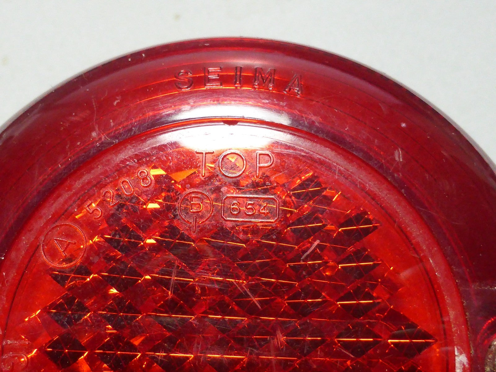 NOS FEU rouge de feu arriére éclairage plaque d'origine Seima diamétre 94 mm