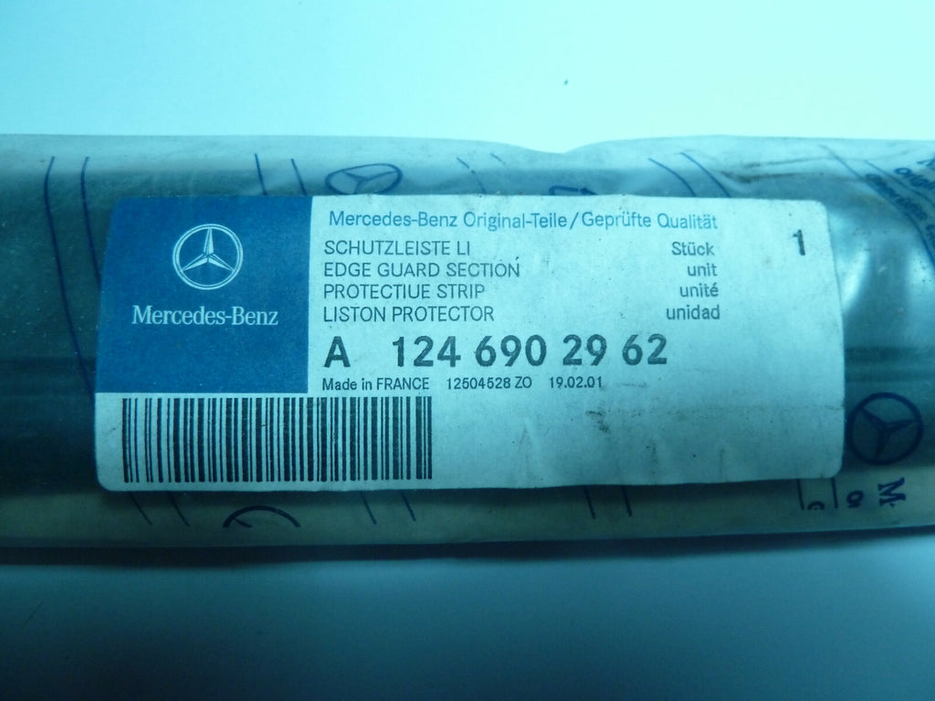 A 12469029620 Mercedes W 124 baguette cote gauche LEFT FRONT FENDER BUMPER STRIP
