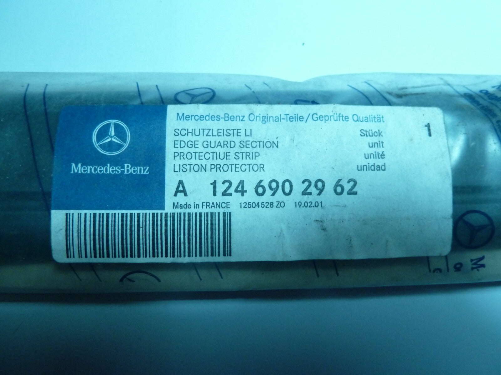 A 12469029620 Mercedes W 124 baguette cote gauche LEFT FRONT FENDER BUMPER STRIP