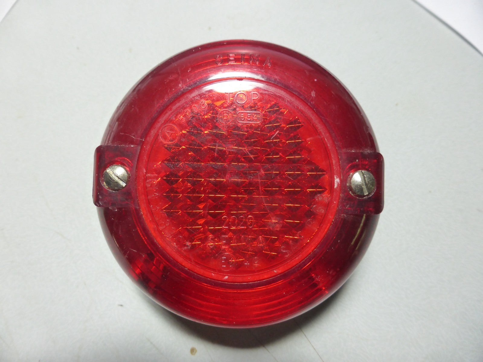 NOS FEU rouge de feu arriére éclairage plaque d'origine Seima diamétre 94 mm