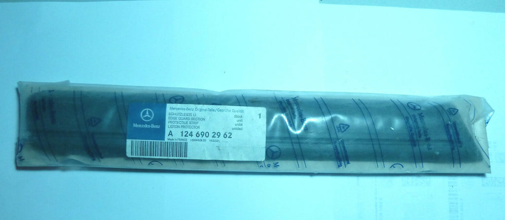 A 12469029620 Mercedes W 124 baguette cote gauche LEFT FRONT FENDER BUMPER STRIP