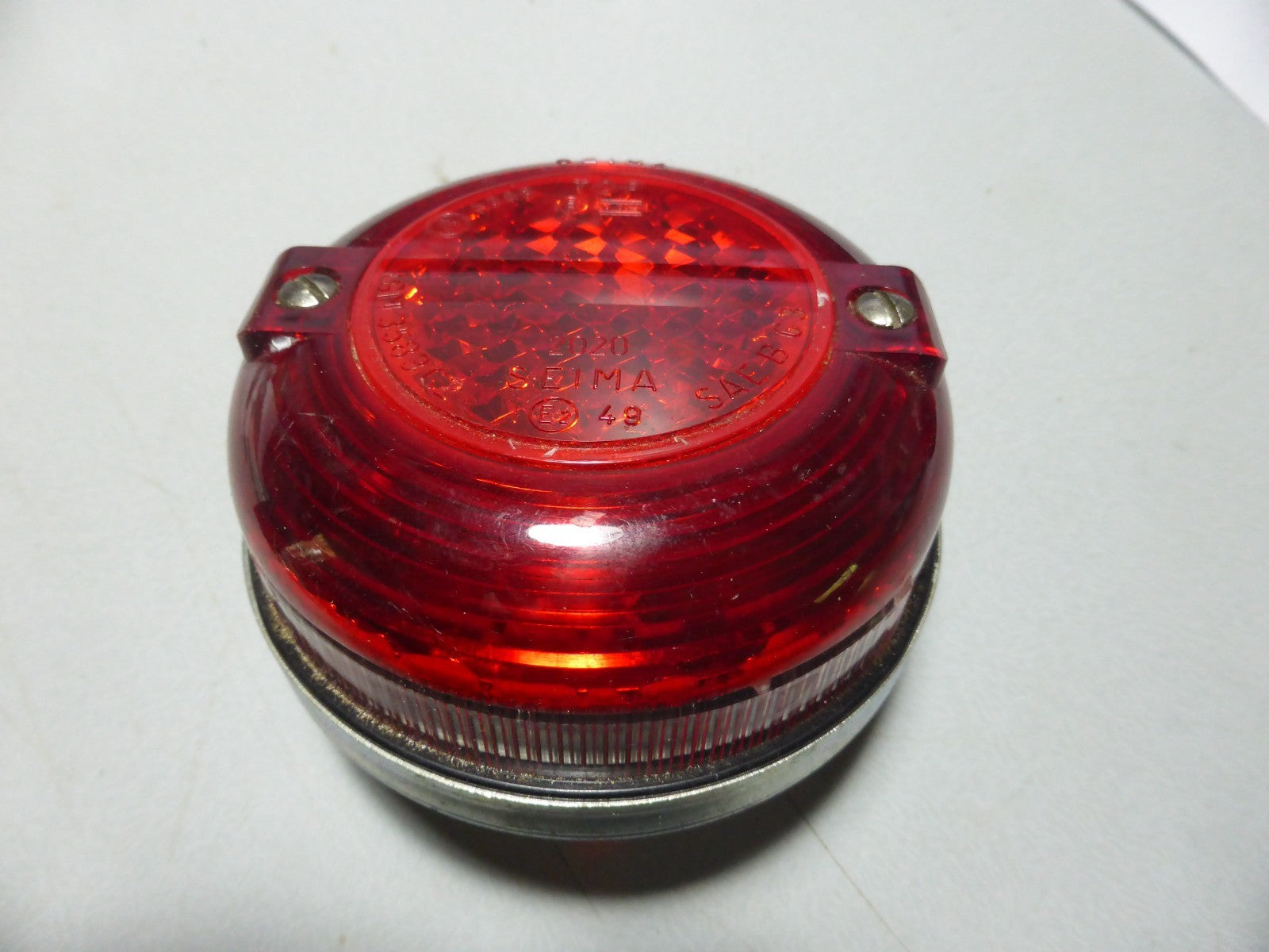NOS FEU rouge de feu arriére éclairage plaque d'origine Seima diamétre 94 mm