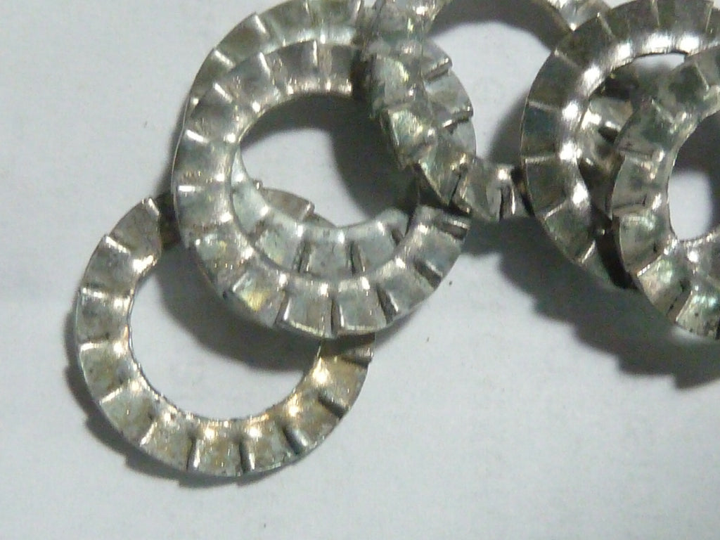 Lot 14 Rondelles 17x10 freins cranté éventail  Diam 17 mm Trou 10 mm .Lot de 14