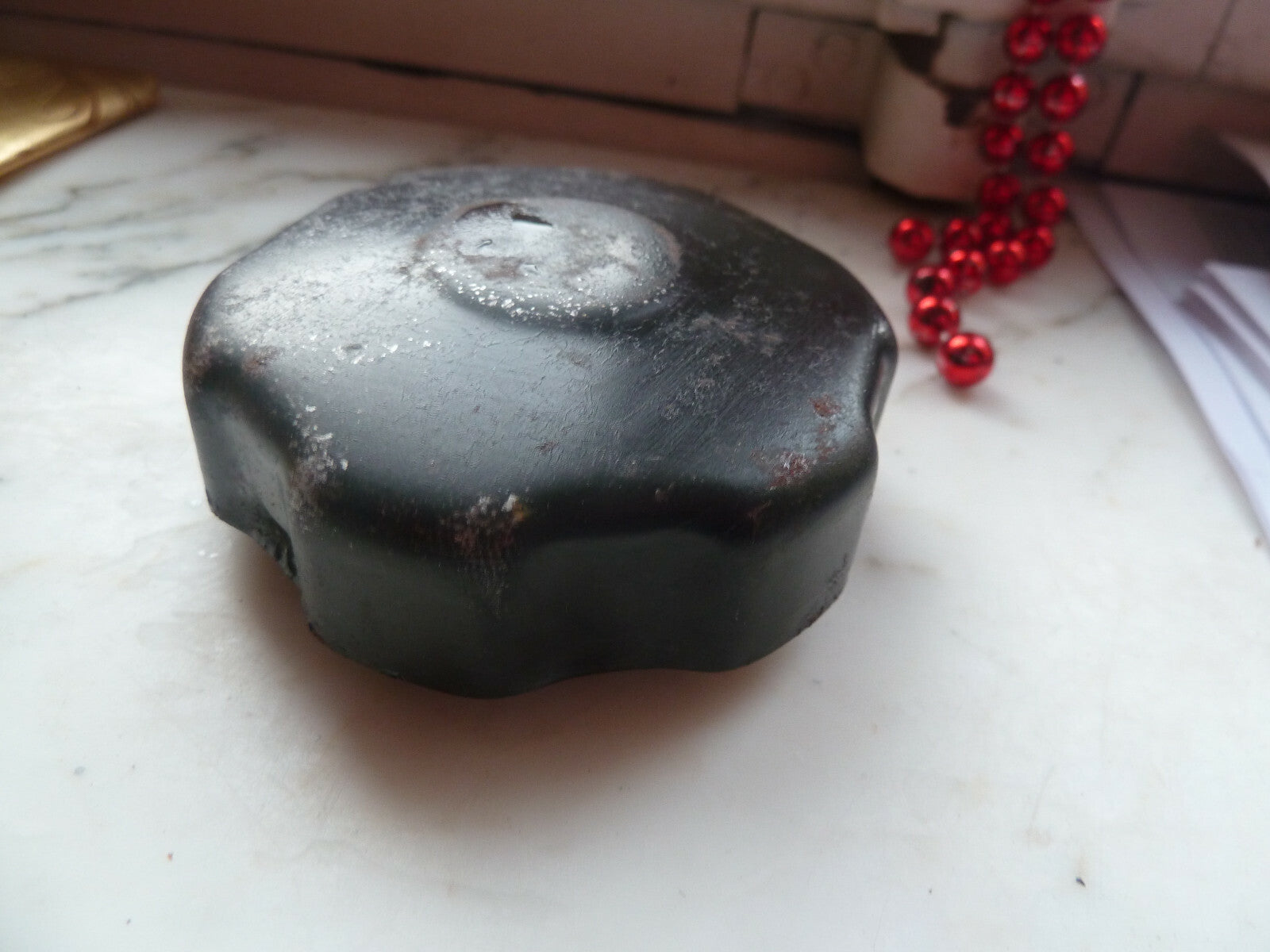 Ancien bouchon de réservoir